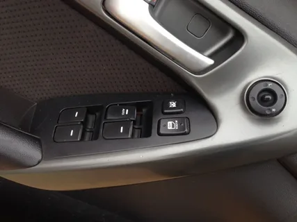 Kia Cerato Boot Lock Button